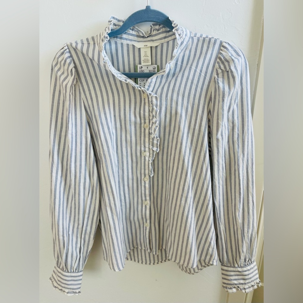 H & M top with ruffle collar. Brand new. Size small. Blue & white stripe. Cotton